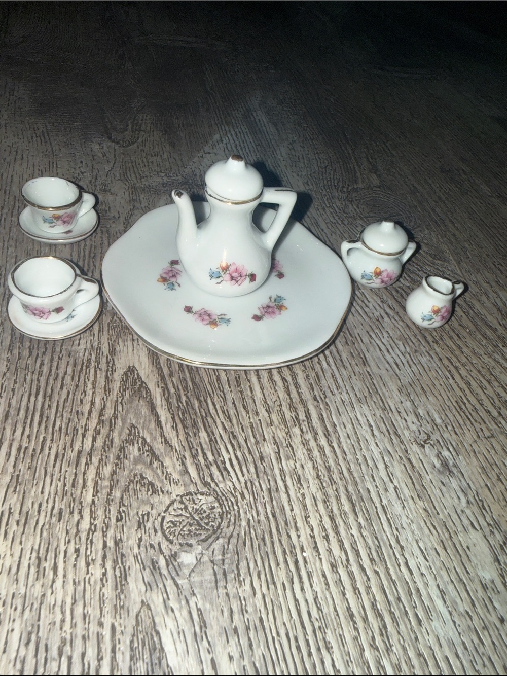 Delicate White Porcelain Mini Tea Set with Pink Floral Motif